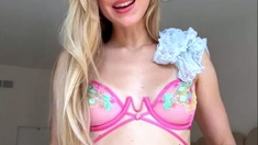Blonde teen slut plays with a toy banana