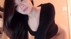Naughty Japanese babe Ayaka Tomoda masturbates