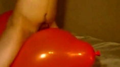 Big inflatable orange balloon humping cum