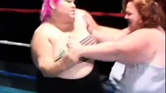 Chubby ladies play with a dildo and share a midget's cock in the ring